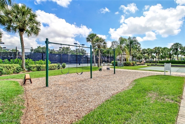 view of community featuring a yard