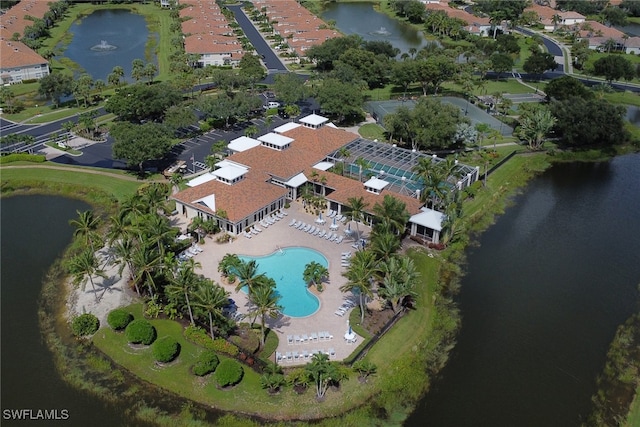 drone / aerial view with a water view