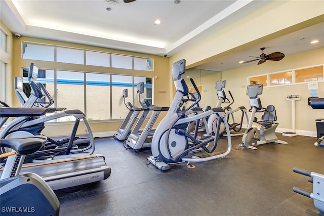 exercise room with ceiling fan