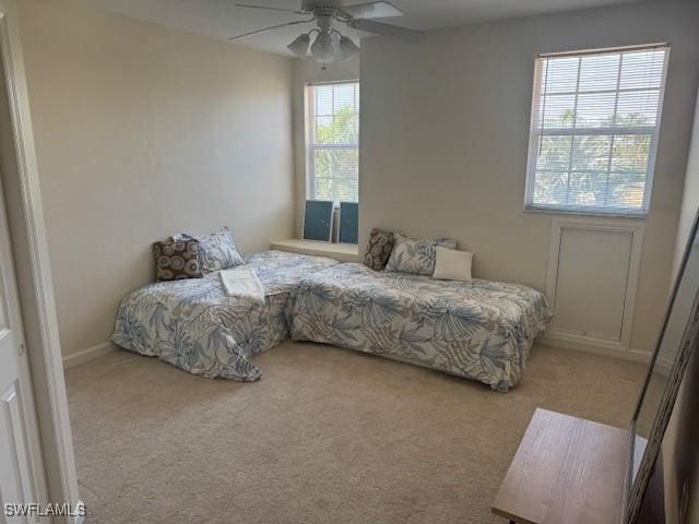 3065 Driftwood Way Unit 4206, Naples, FL 34109 - bedroom with carpet floors and a ceiling fan