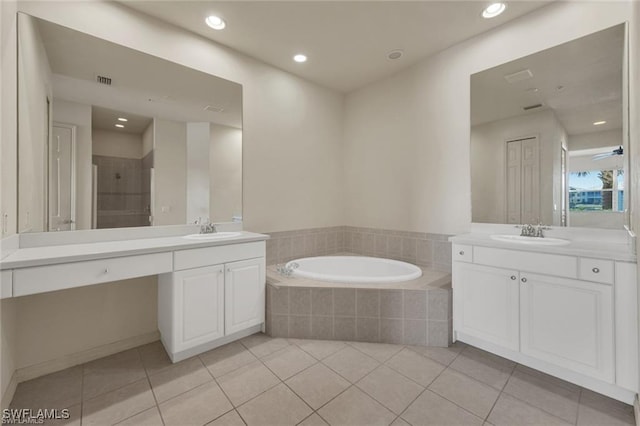 bathroom with separate shower and tub, tile patterned flooring, and vanity