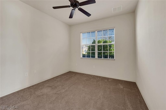 carpeted empty room with ceiling fan