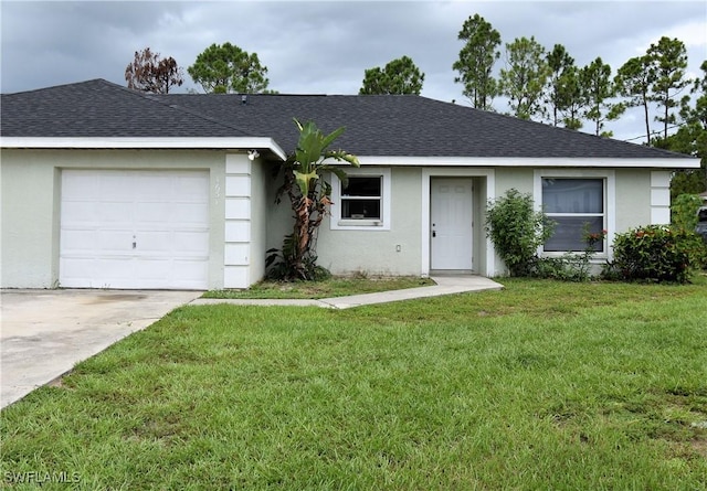 ranch-style home with a garage and a front yard