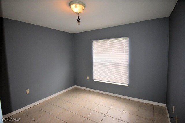 view of tiled spare room