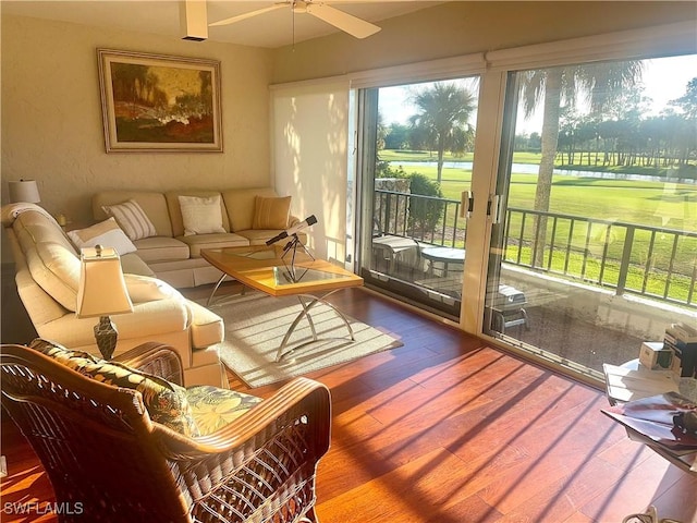 sunroom / solarium with ceiling fan