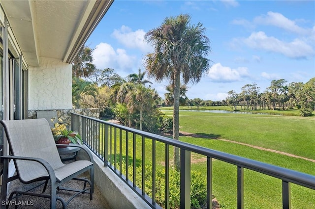 balcony featuring a water view