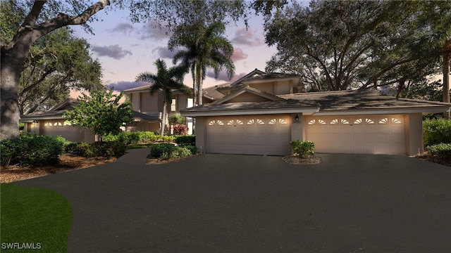 view of front of property with a garage