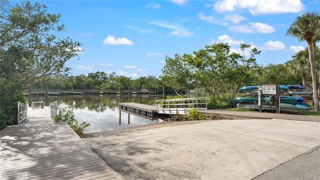 dock area with a water view