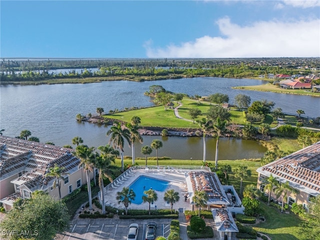 bird's eye view with a water view