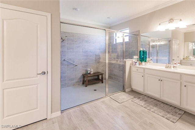 bathroom featuring hardwood / wood-style flooring, vanity, a shower with shower door, and ornamental molding