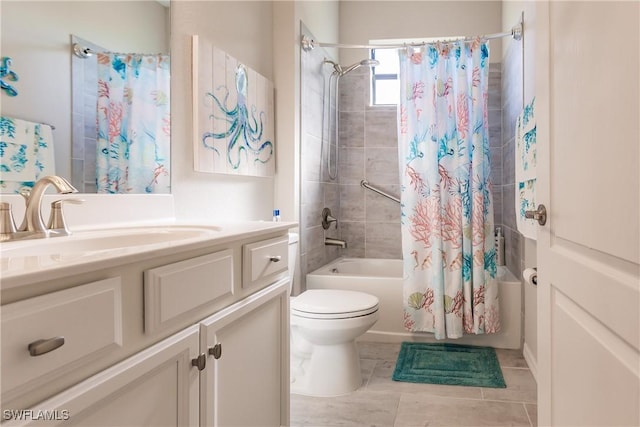 full bathroom featuring tile patterned flooring, vanity, toilet, and shower / bath combo with shower curtain