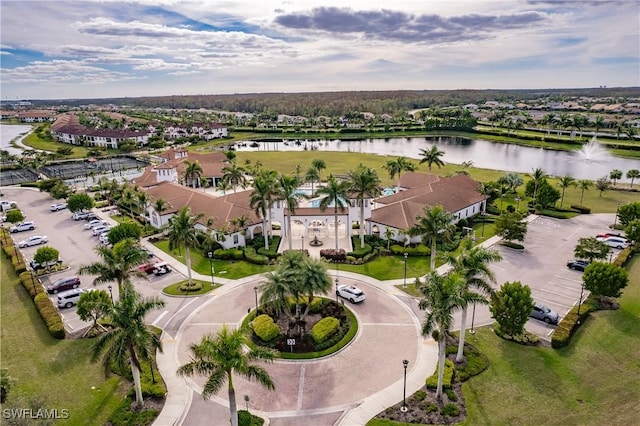 drone / aerial view with a water view