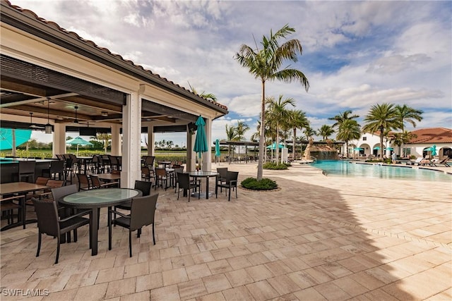 view of patio / terrace featuring a community pool