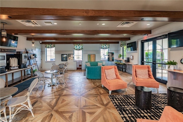 living room featuring french doors, beamed ceiling, and light parquet floors