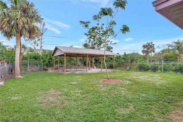 view of yard with a gazebo and a patio