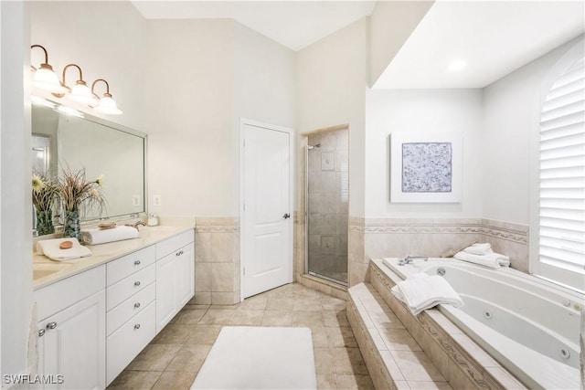 bathroom with vanity, separate shower and tub, and tile patterned floors