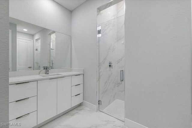 bathroom featuring vanity and walk in shower