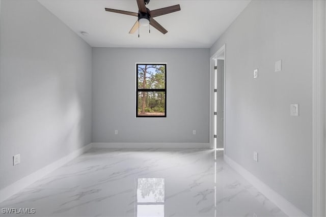 spare room with ceiling fan