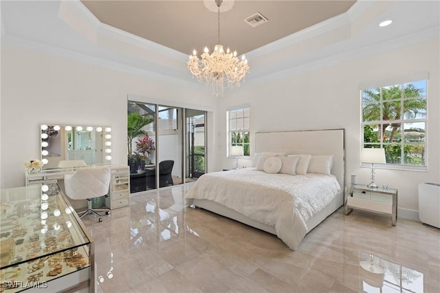 bedroom with a notable chandelier, crown molding, and a raised ceiling