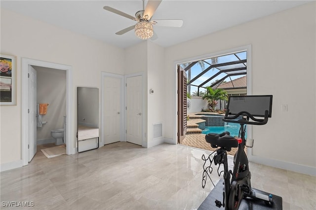 exercise room featuring ceiling fan