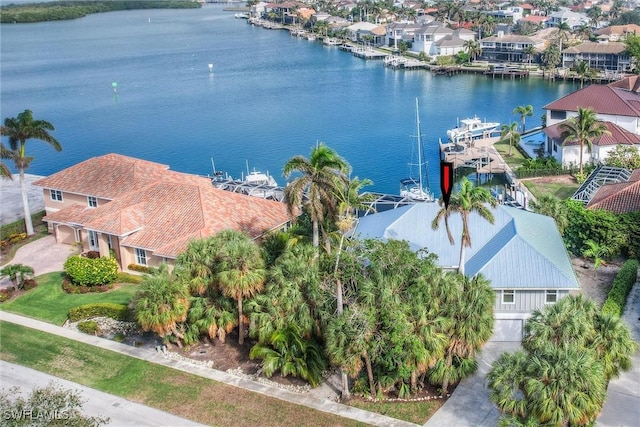 drone / aerial view with a water view