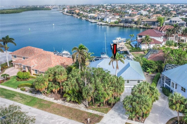 drone / aerial view with a water view