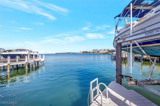 view of dock with a water view