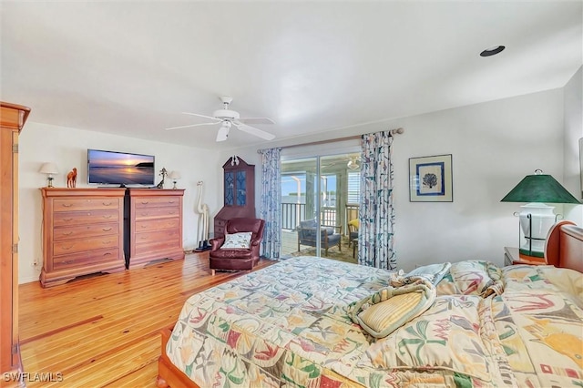 bedroom featuring hardwood / wood-style floors, access to outside, and ceiling fan