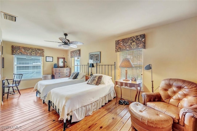 bedroom featuring ceiling fan and light hardwood / wood-style floors