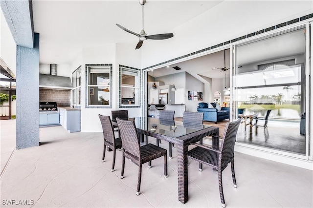 dining space with ceiling fan