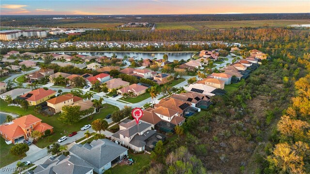 9954 Via Loop, San Marco Loop, Fort Myers, FL 33905 - aerial view at dusk of a residential view and a water view