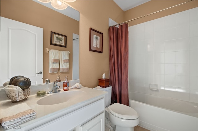 full bathroom with shower / bath combo with shower curtain, vanity, and toilet