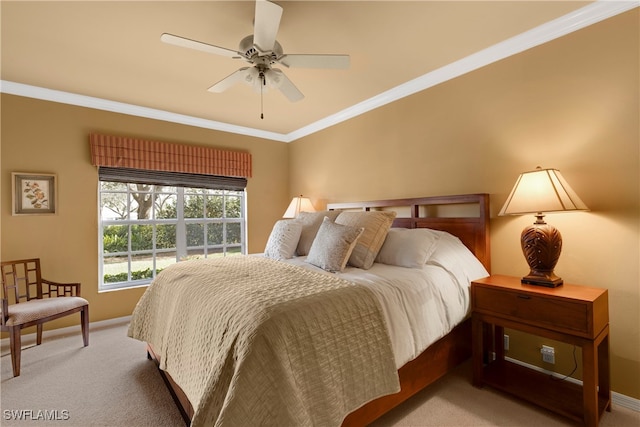 bedroom with light carpet, ceiling fan, and crown molding