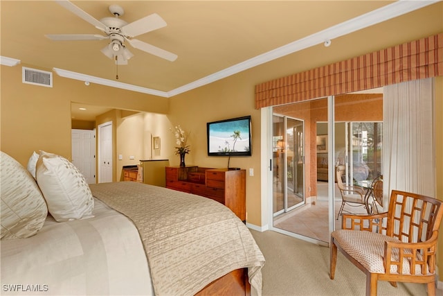 bedroom featuring ceiling fan, carpet flooring, and ornamental molding