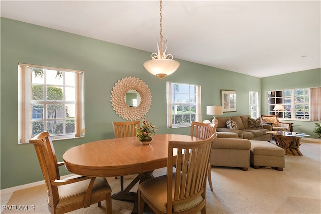 view of carpeted dining area