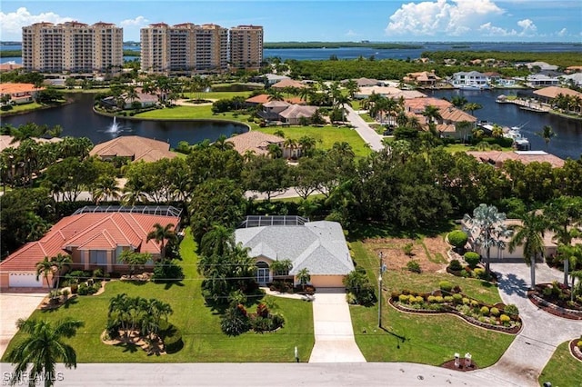 bird's eye view with a water view