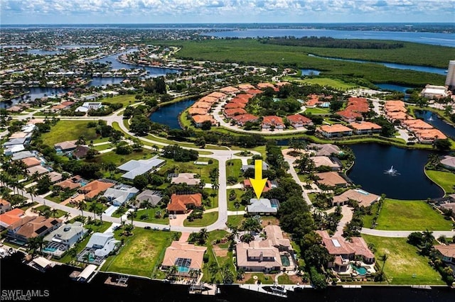 drone / aerial view with a water view