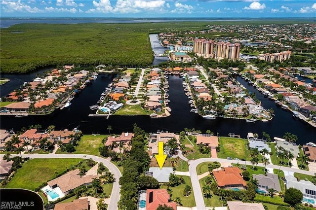 drone / aerial view with a water view