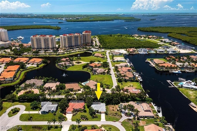 drone / aerial view with a water view