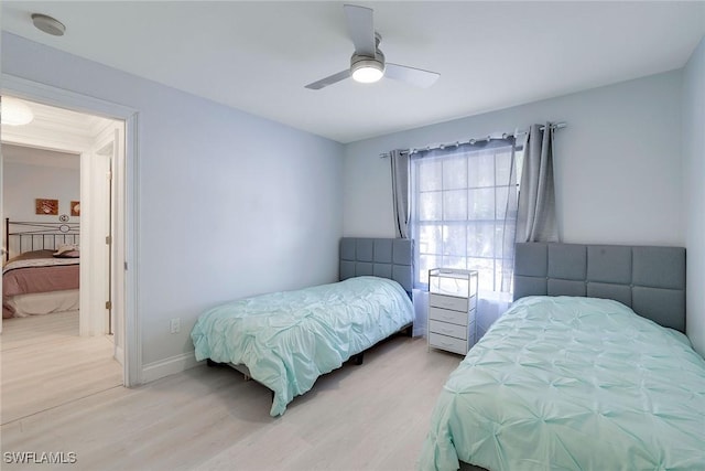 1191 13th St SW, Naples, FL 34117 - bedroom with wood finished floors and a ceiling fan