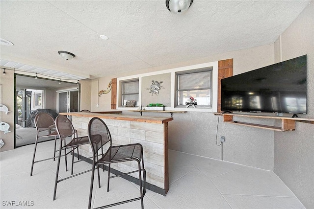 interior space featuring a breakfast bar