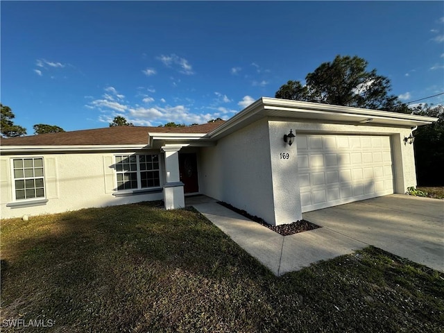 single story home featuring a garage