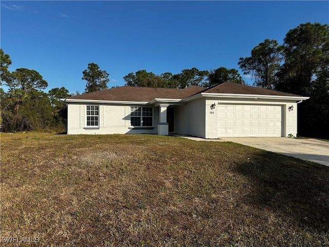 single story home featuring a front yard and a garage