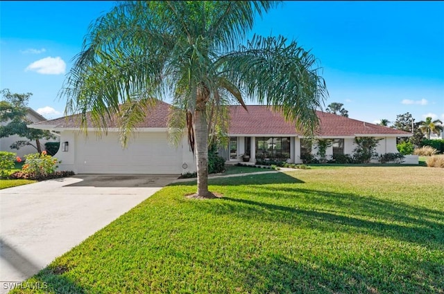 ranch-style home with a garage and a front lawn