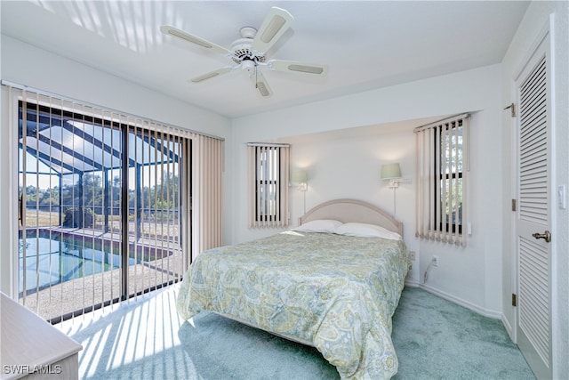 carpeted bedroom with access to exterior, a closet, and ceiling fan