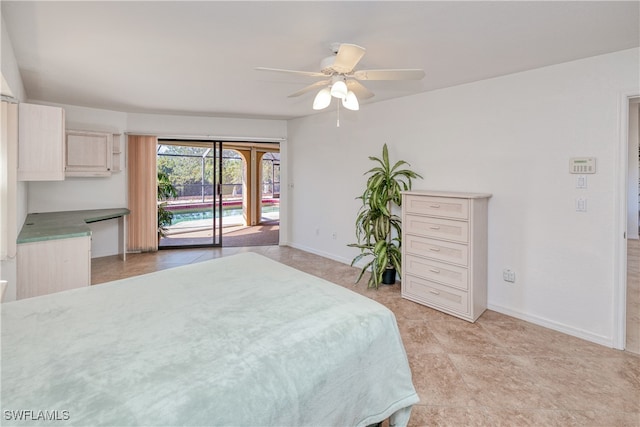 bedroom featuring ceiling fan and access to exterior