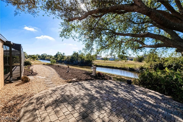 view of patio / terrace featuring a water view