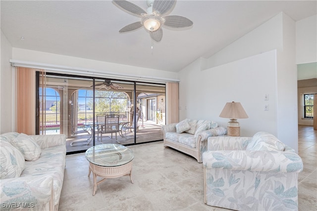 living room featuring vaulted ceiling