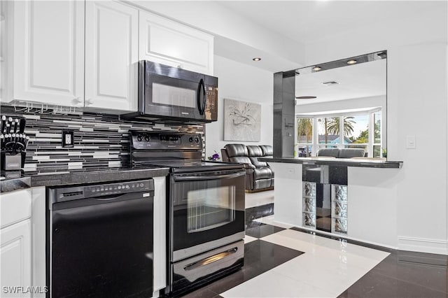 kitchen with black appliances, decorative backsplash, and white cabinetry