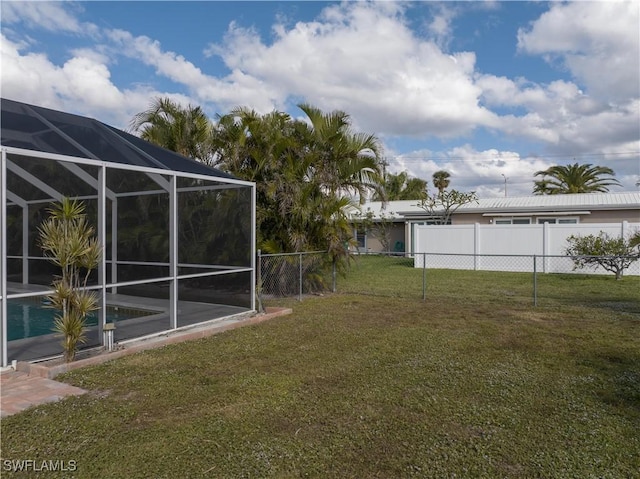 view of yard featuring a lanai